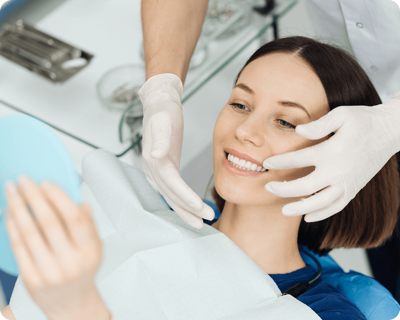 Dentist examining patient's teeth