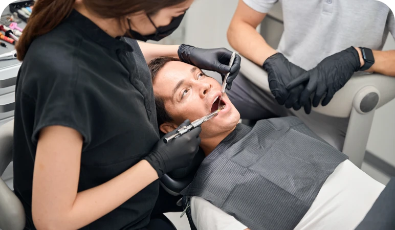 Patient receiving dental treatment